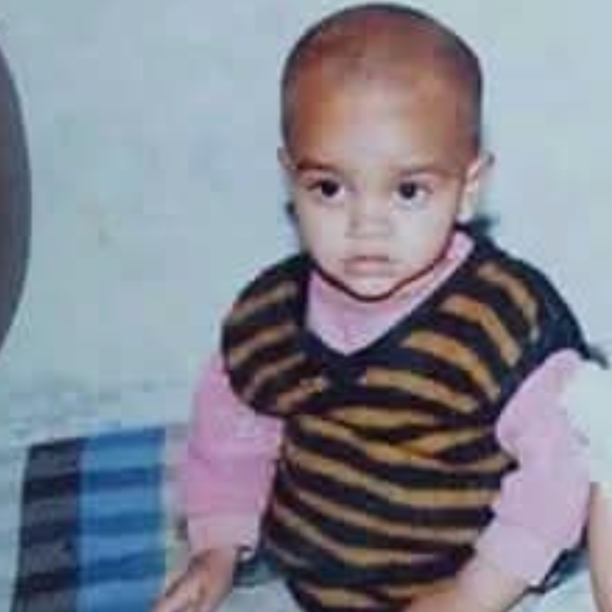 Team Member 14 Childhood